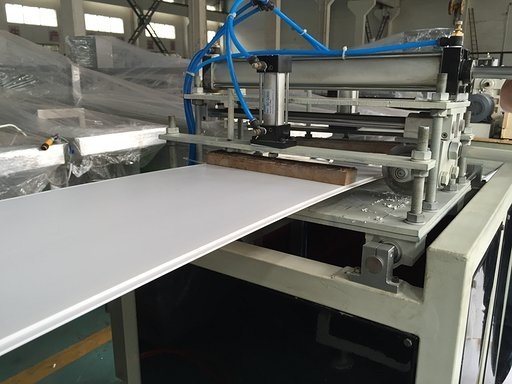 Cutter clamping down on ceiling panel
