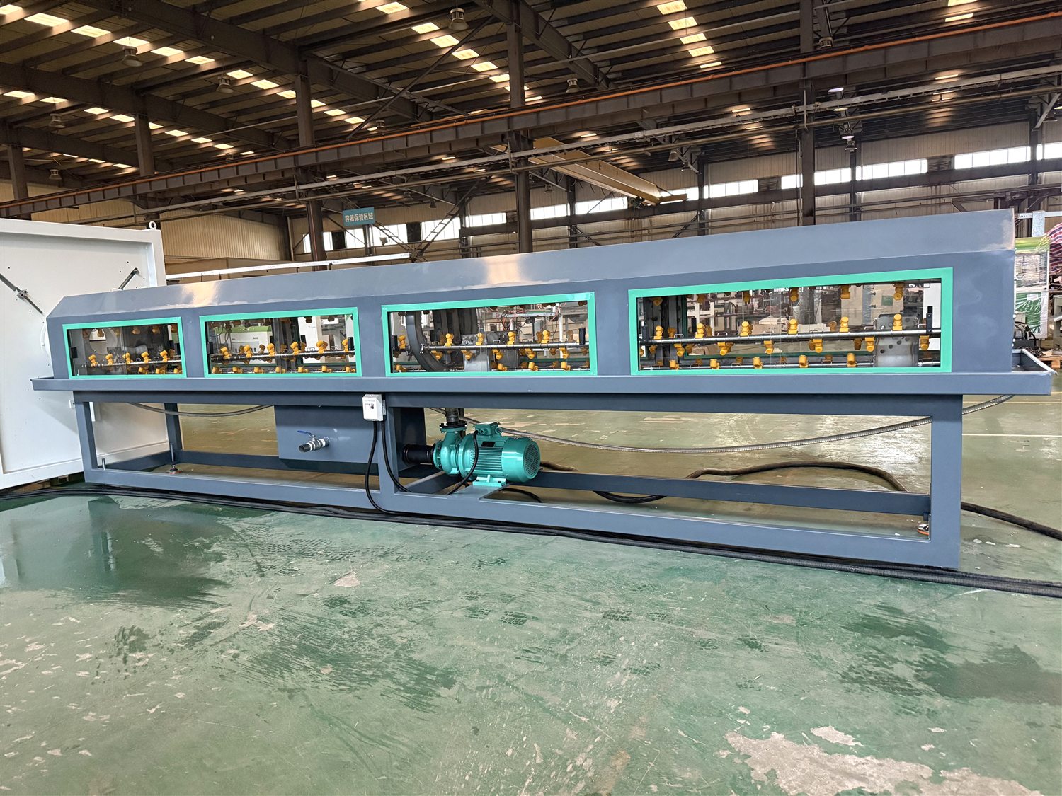 Four-belt haul-off for large diameter PVC pipe - BENK Machinery