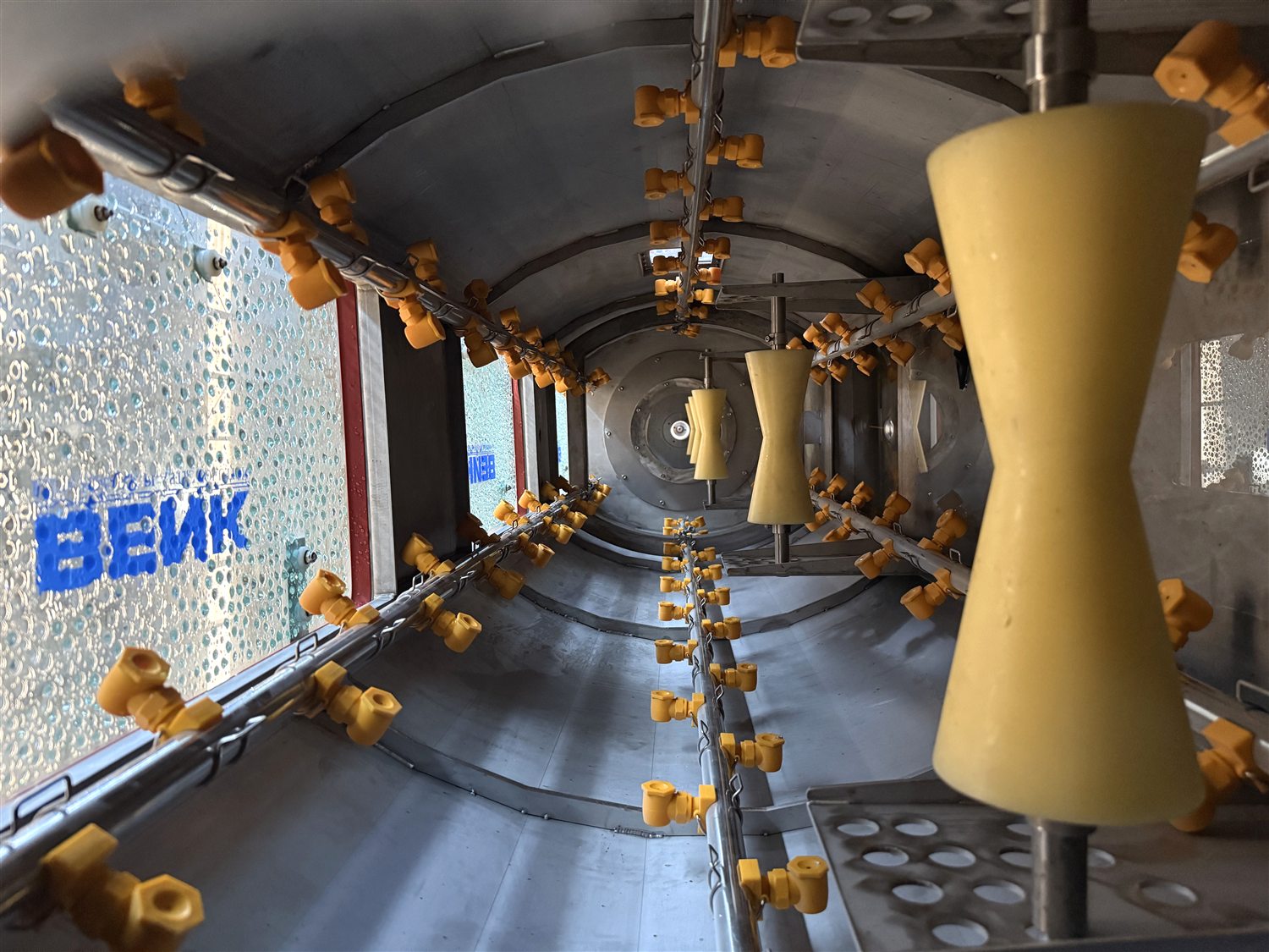 Spray cooling tank interior - BENK Machinery