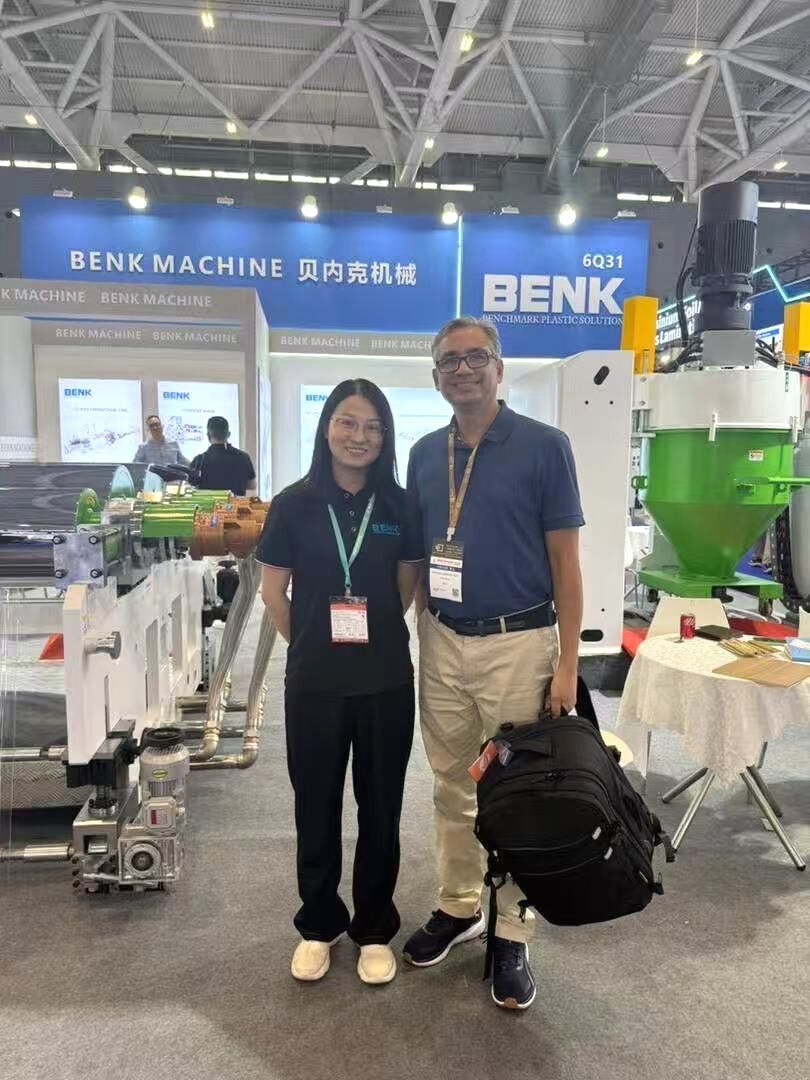 BENK Machinery team with European customer at CHINAPLAS 2025 booth 6Q31