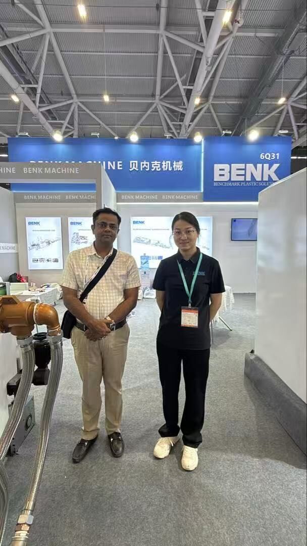 BENK Machinery team with South Asian customer at CHINAPLAS 2025